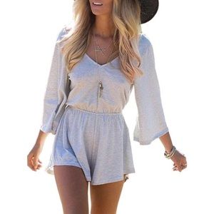 Brand new condition grey romper